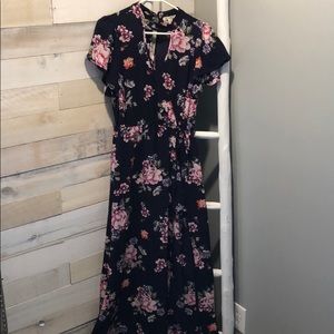 Navy floral romper with fabric overlay